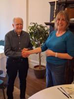 New member David being welcomed by president Katy, May 2026